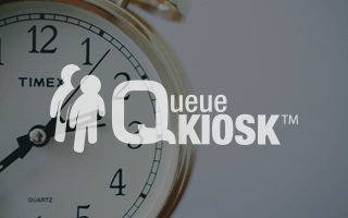 The QueueKiosk logo laid overtop of a clock image.